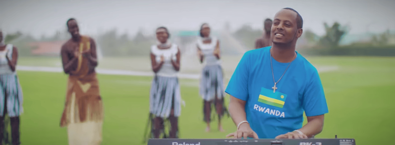 Kizito-Mihigo-in-Rwanda-T-shirt-performs-with-backup-singers, The shocking death of Rwandan gospel singer and dissident Kizito Mihigo, World News & Views 