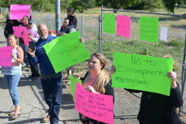 Protesters-block-gate-at-Vacaville-Tiny-Shelter-homeless-housing-site-043019-by-Robinson-Kuntz-Daily-Republic, Vacaville’s housing crisis, Local News & Views 