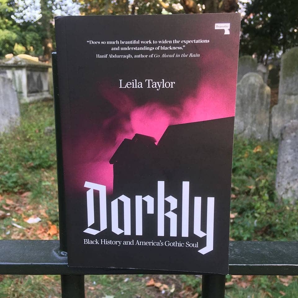 Darkly-by-Leila-Taylor-cover-on-graveyard-fence, #Writing While Black – March 2020 Edition: Afrocentric literature intersects with music, art and film, Culture Currents 