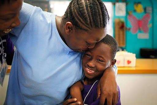 Montgomery-Jones-hugs-son-Levell-Jones-after-17-mo.-separation-at-CIW-in-Chino-CA-by-Lucy-Nicholson-Reuters, California Coalition for Women Prisoners: Protect our sisters’ health and safety, free the elders!, Abolition Now! 