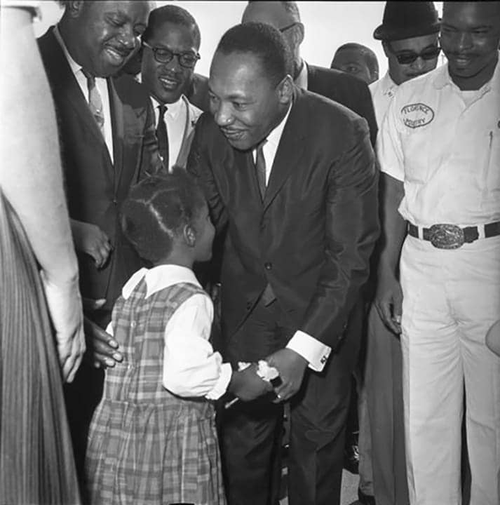 Dr.-Martin-Luther-King-chats-w-lil-girl-Nickerson-Gardens-project-LA-Watts-1964, Wanda’s Picks for April 2020, Culture Currents 