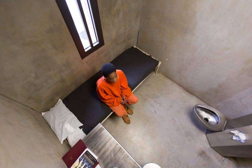 Black-teenage-boy-sits-alone-in-cell-Tuscaloosa-County-Juvenile-Detention-Center-in-Alabama, How many children in Alabama’s juvenile detention facilities are at risk of death from COVID-19?, Abolition Now! 