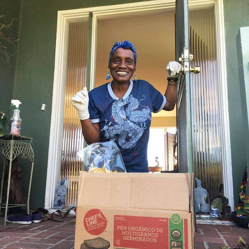 Happy-elder-receives-food-box-from-East-Oakland-Collective, COVID-19 further burdens Oakland’s Black homeless population’s quest to survive, Local News & Views 