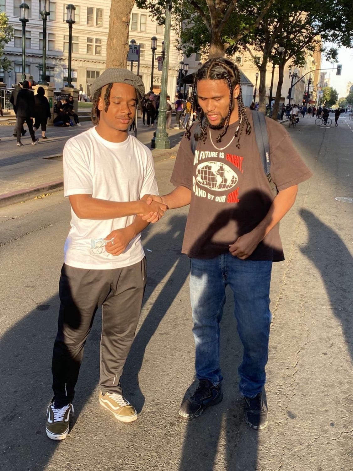 Youth-lead-15000-march-from-Oakland-Tech-to-Oscar-Grant-Plaza-060120-student-leaders-Akil-Riley-Xavier-Brown-congratulate-each-other-at-march-end, Oakland youth lead 15,000 marching for George Floyd, Local News & Views 