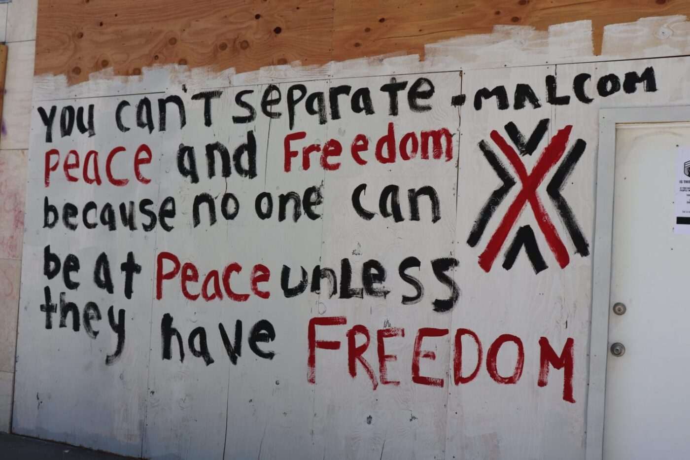 ‘You-can’t-separate-peace-and-freedom-Malcolm’-mural-on-boarded-up-window-Oakland-0720-by-JR-1-1400x933, The July expiration of the COVID-19 eviction ban and unemployment bonus leads to calls for a General Strike, Local News & Views 