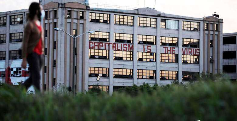 Capitalism-is-the-virus-painted-on-abandoned-factory-in-New-Orleans-by-Carlos-Barria-Reuters, Jalil Muntaqim: Future focused in Black August 2020, Abolition Now! 