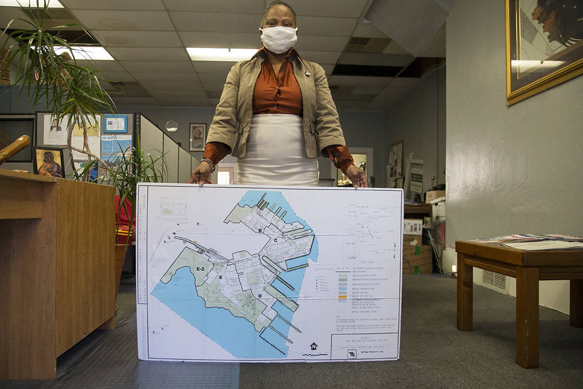Dr.-Ahimsa-Sumchai-displays-pin-map-at-HP-Biomonitoring-Clinic-at-3rd-St-Revere-0720-by-Kevin-N.-Hume-SF-Examiner, Hunters Point demands a voice on shipyard cleanup: Reinstate the RAB now!, Local News & Views 