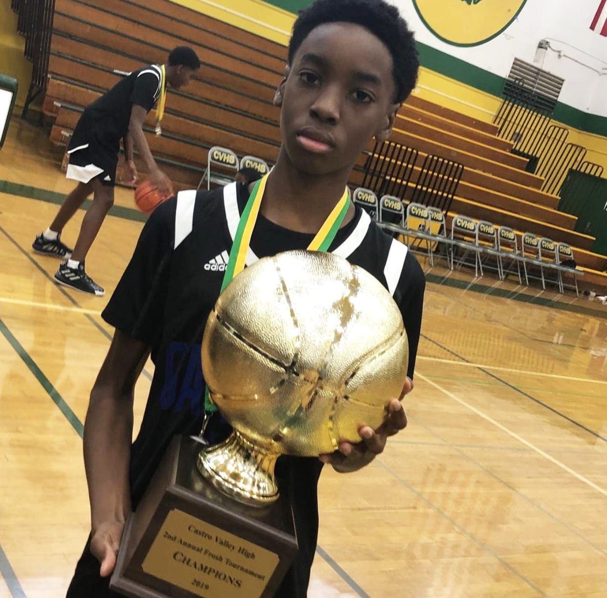 Jeremiah-Riley-14-son-of-Iesha-James-with-basketball-trophy, Help rebuild 14-year-old Jeremiah, struck by a stray bullet in East Oakland, Local News & Views 