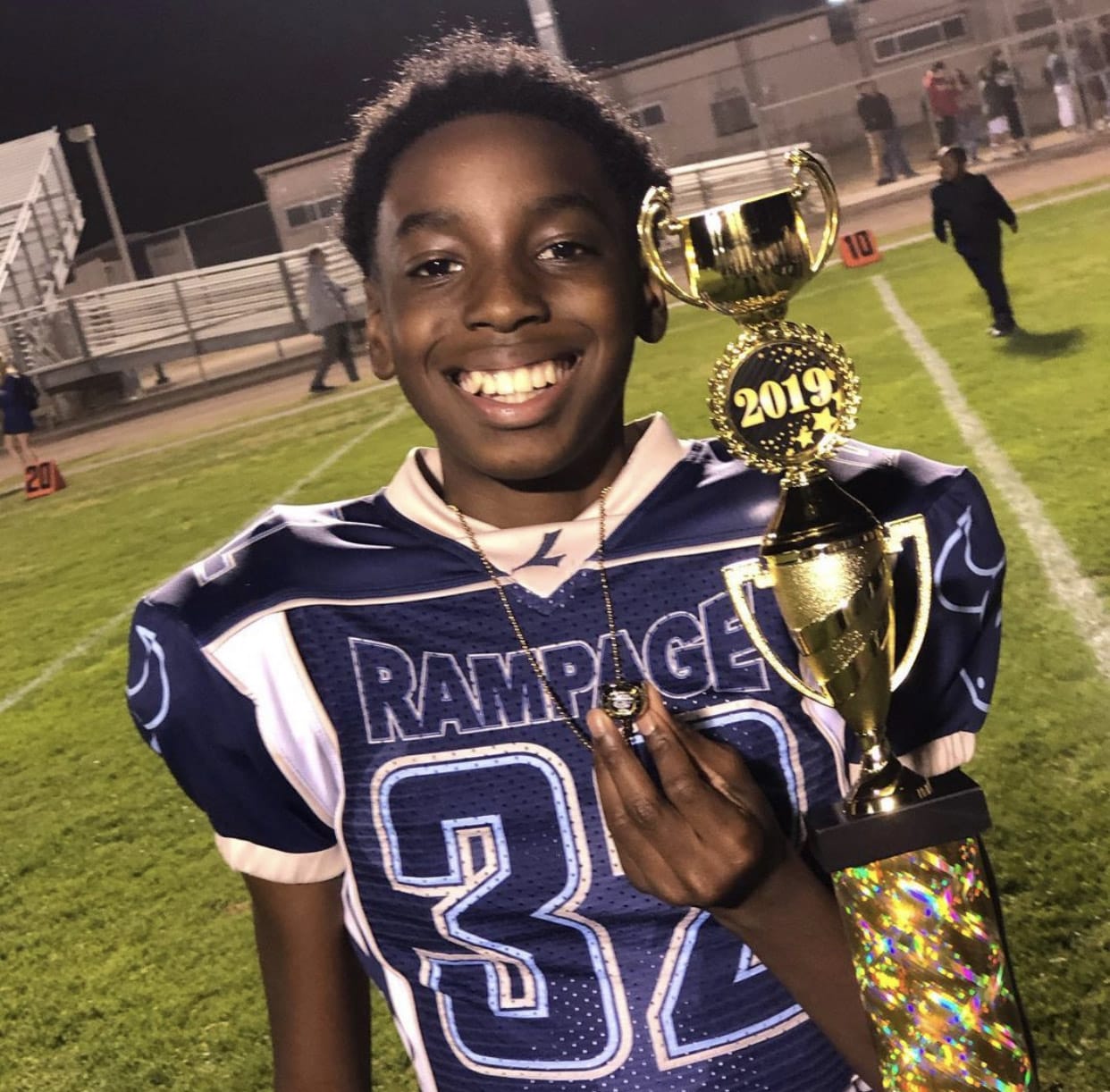 Jeremiah-Riley-14-son-of-Iesha-James-with-football-trophy, Help rebuild 14-year-old Jeremiah, struck by a stray bullet in East Oakland, Local News & Views 