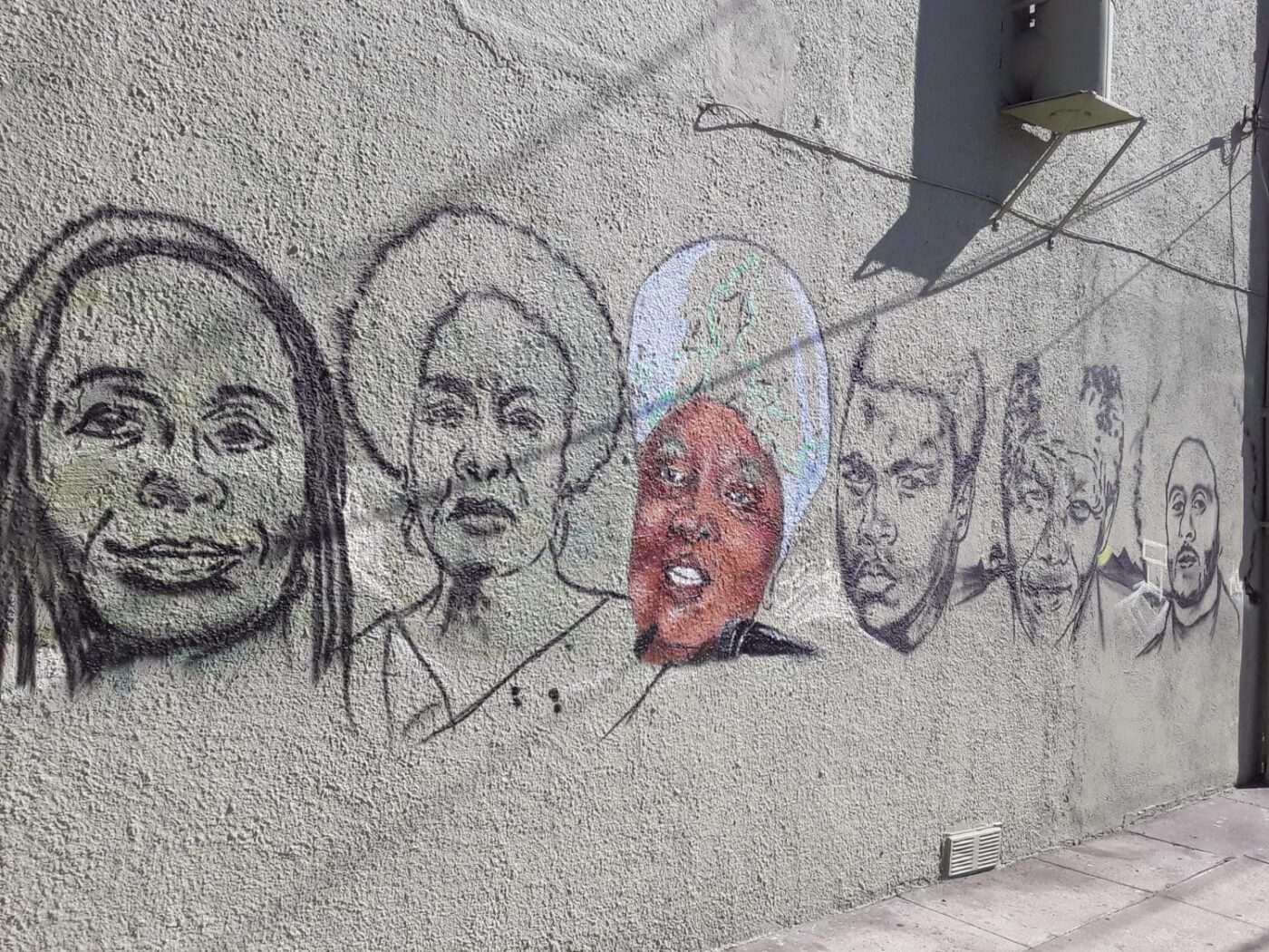 Kufu-mural-87th-International-Oakland-Tarika-Lewis-Dr.-Frances-Cress-Welsing-Shahrazad-Ali-Muhammad-Ali-Marcus-Garvey-Colin-Kaepernick-0720-1400x1050, Black muralist Kufu attacks the walls of East Oakland to show us our fighting heart and soul, Culture Currents 