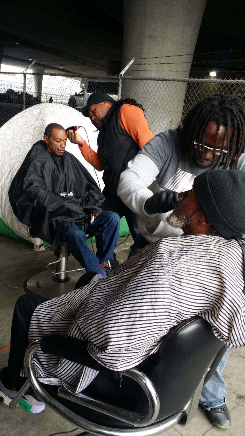 Struggle-to-Bubble-barbering-at-homeless-encampment, Struggle to Bubble is still empowering homeless people amid the pandemic in Oakland, Local News & Views 