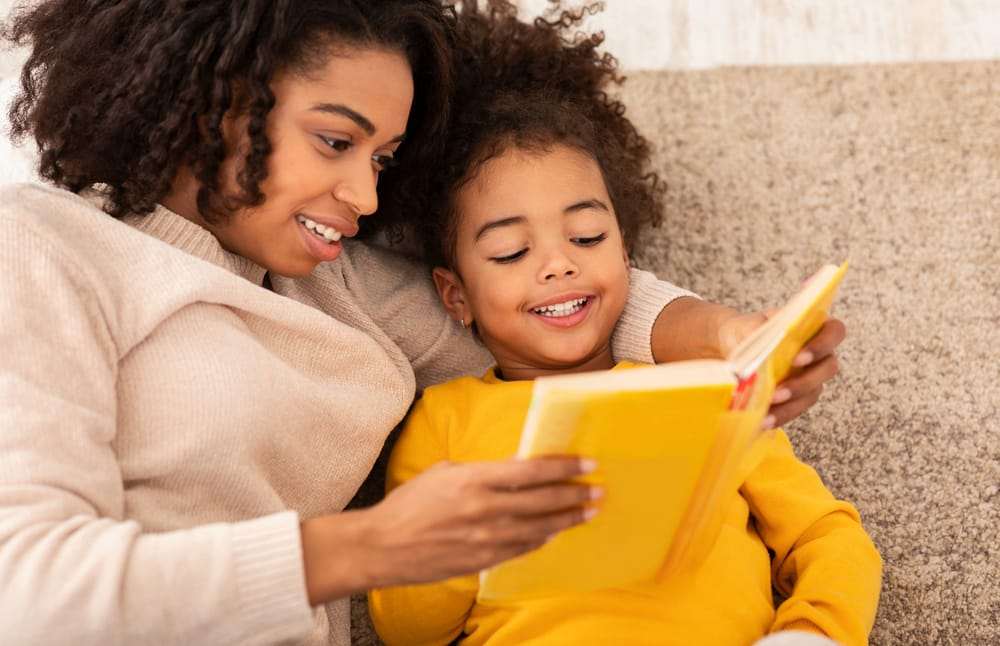 Mom-and-daughter-reading, Having ‘The Talk’ with your children in the era of Black Lives Matter, Culture Currents 