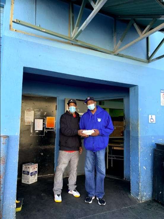 Volunteer-heroes-Willie-Thomas-Ruben-Burney-at-Mother-Browns-Thanksgiving-Day-112620-by-Nube, Mother Brown’s serves up respect on the day of gratitude, Culture Currents 