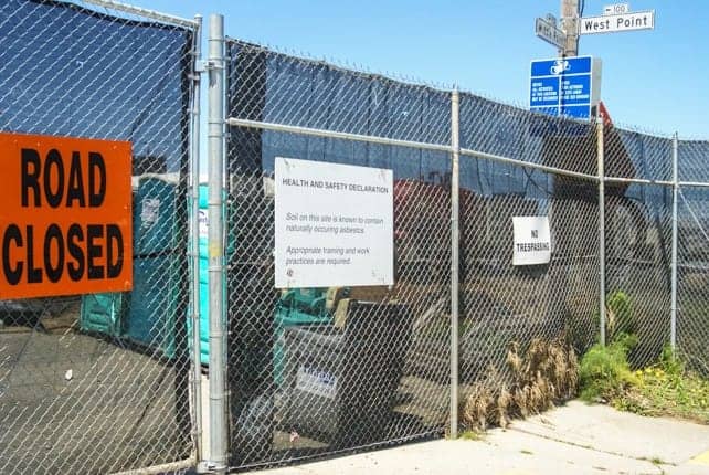 Fenceline-betw-public-housing-Hunters-Point-Shipyard-on-HP-hilltop, Renewed call for shipyard excavation moratorium – the legal legacy of harm to the Hunters Point community, Local News & Views 