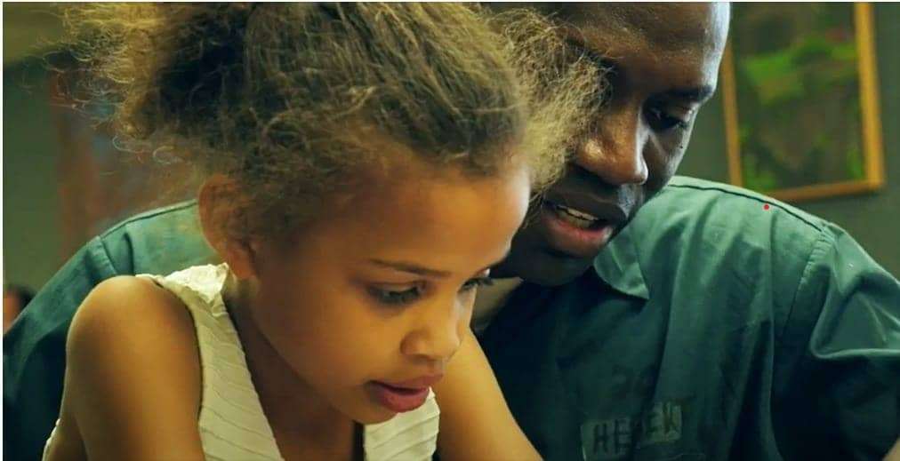 Lil-girl-visits-dad-in-prison, Parenting from prison: Ways to maintain your family ties while incarcerated, Culture Currents 