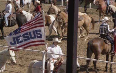 Angola-Prison-Rodeo-prisoner-carries-‘Jesus-flag-2009-by-Tim-McKulka, The Angola gulag, Abolition Now! 