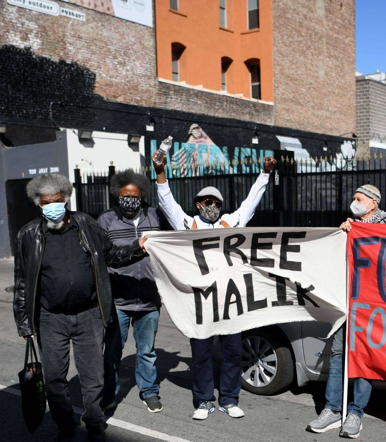 Free-Malik-rally-111-Taylor-Gerald-Smith-Arthur-League-unk-Charlie-Hinton-030721-by-Johnnie-Burrell, Journalist detained at GEO Group halfway house faces retaliation for exposing COVID-19 outbreak, Local News & Views 