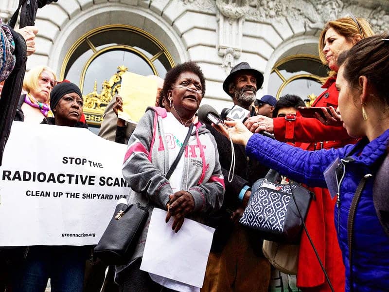 Marie-Harrison-leads-protest-wearing-oxygen-cannulas-prior-to-Hunters-Point-Shipyard-Superfund-site-cleanup-hearing-SF-City-Hall-steps-051418-by-Kevin-N.-Hume-SF-Examiner, Faces of environmental justice, Local News & Views 