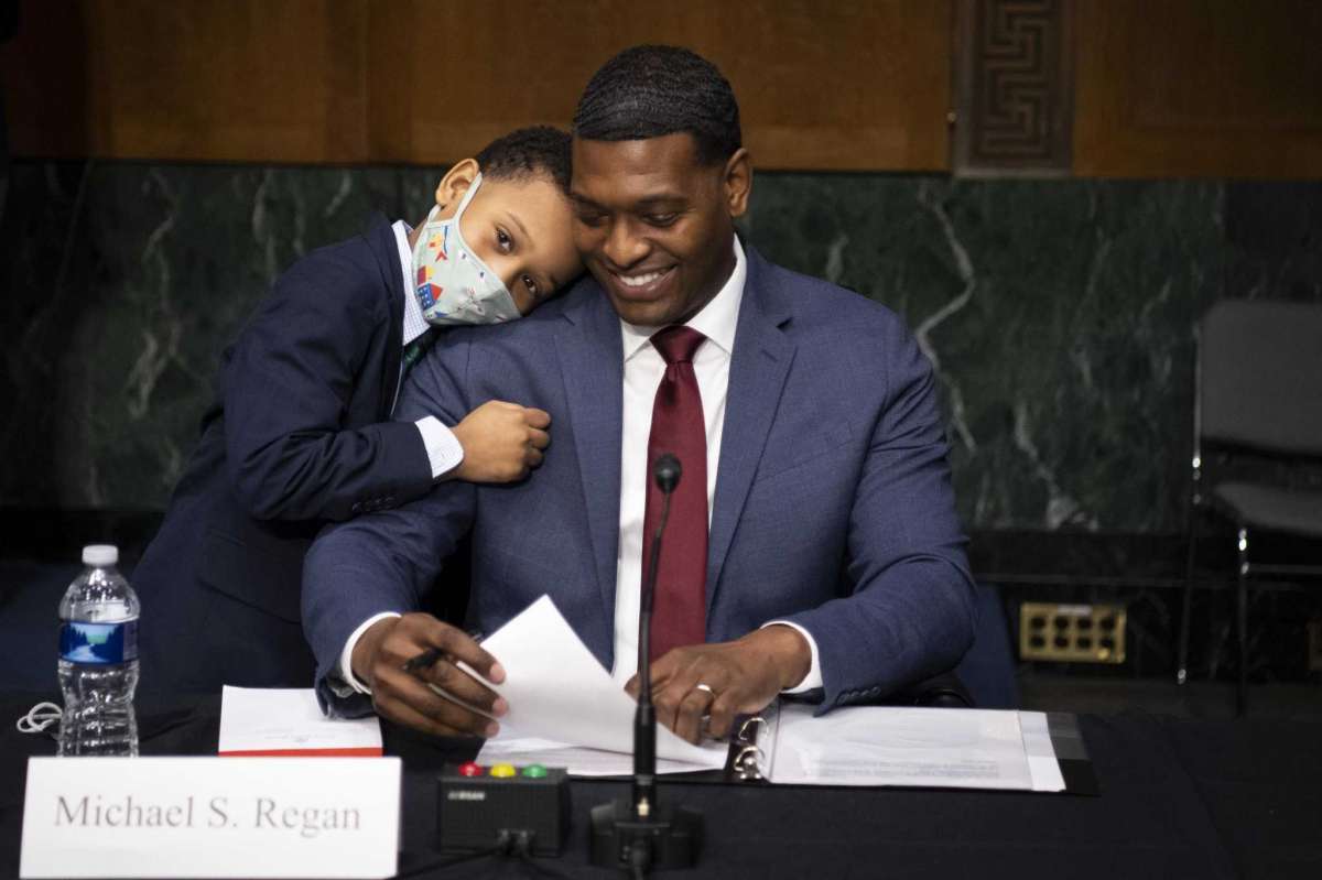 Michael-Regan-congratulated-by-son-Matthew-after-confirmation-as-EPA-admin-by-Senate-Environment-and-Public-Works-Committee-020921-by-Houston-Chron, Faces of environmental justice, Local News & Views 