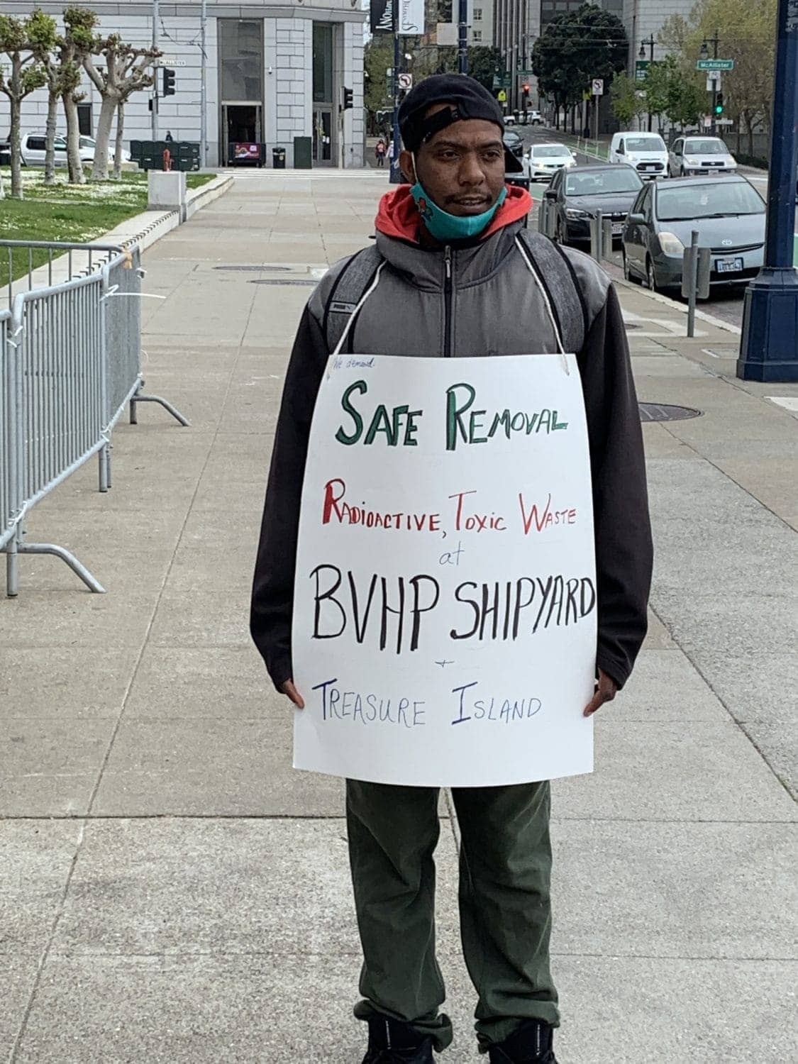 Dominique-wears-sign-‘Safe-removal-radioactive-toxic-waste-BVHP-Shipyard-Treasure-Island-Earth-Day-Rally-City-Hall-042221, Earth Day 2021 in San Francisco!, Local News & Views 