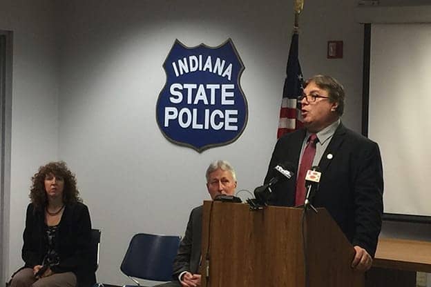Dr.-Michael-Mitcheff-right-chief-medical-officer-Indiana-Prison-System-speaks-to-Indiana-State-Police, Prison leeches: Professionals who live off prisoners’ suffering, Behind Enemy Lines 