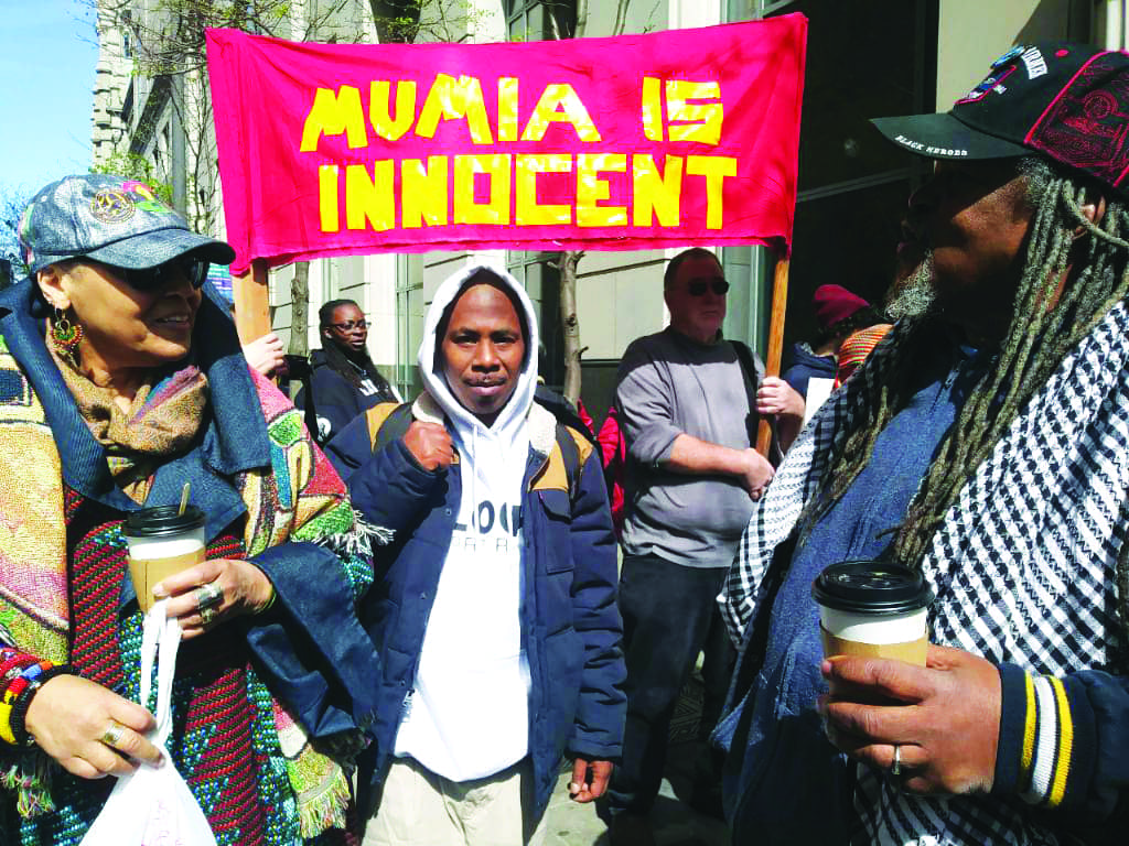 NY-Panthers-Yasmine-Sutton-and-Bullwhip-w-JR-outside-Philly-courthouse-Mumia-hearing-043018-by-BRR, Mumia Abu-Jamal is scheduled for open-heart surgery, Abolition Now! 