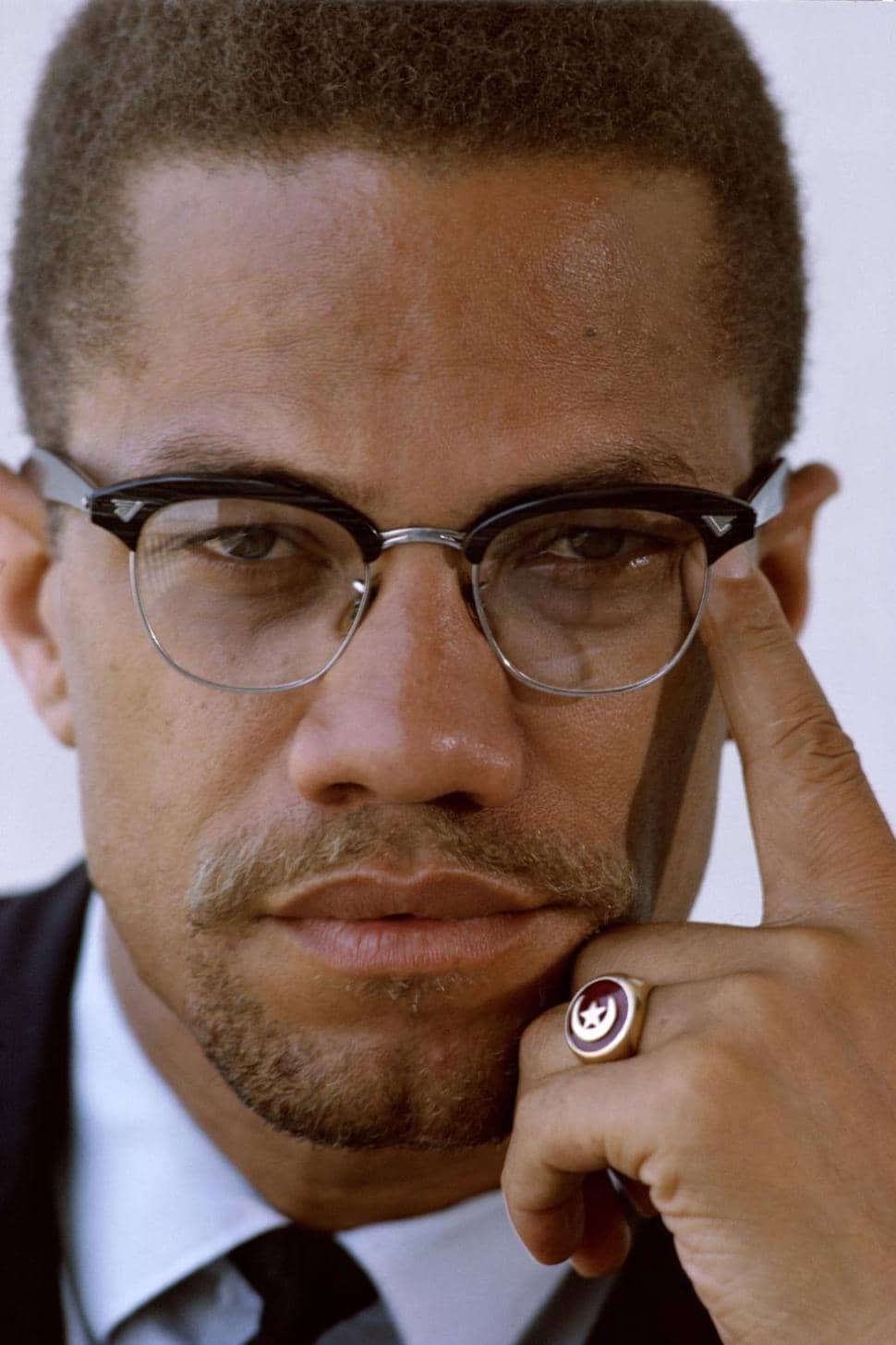 Malcolm-X-classic-pose-color-cy-Estate-of-John-Launois, Meet a poor righteous teacher, Abolition Now! 