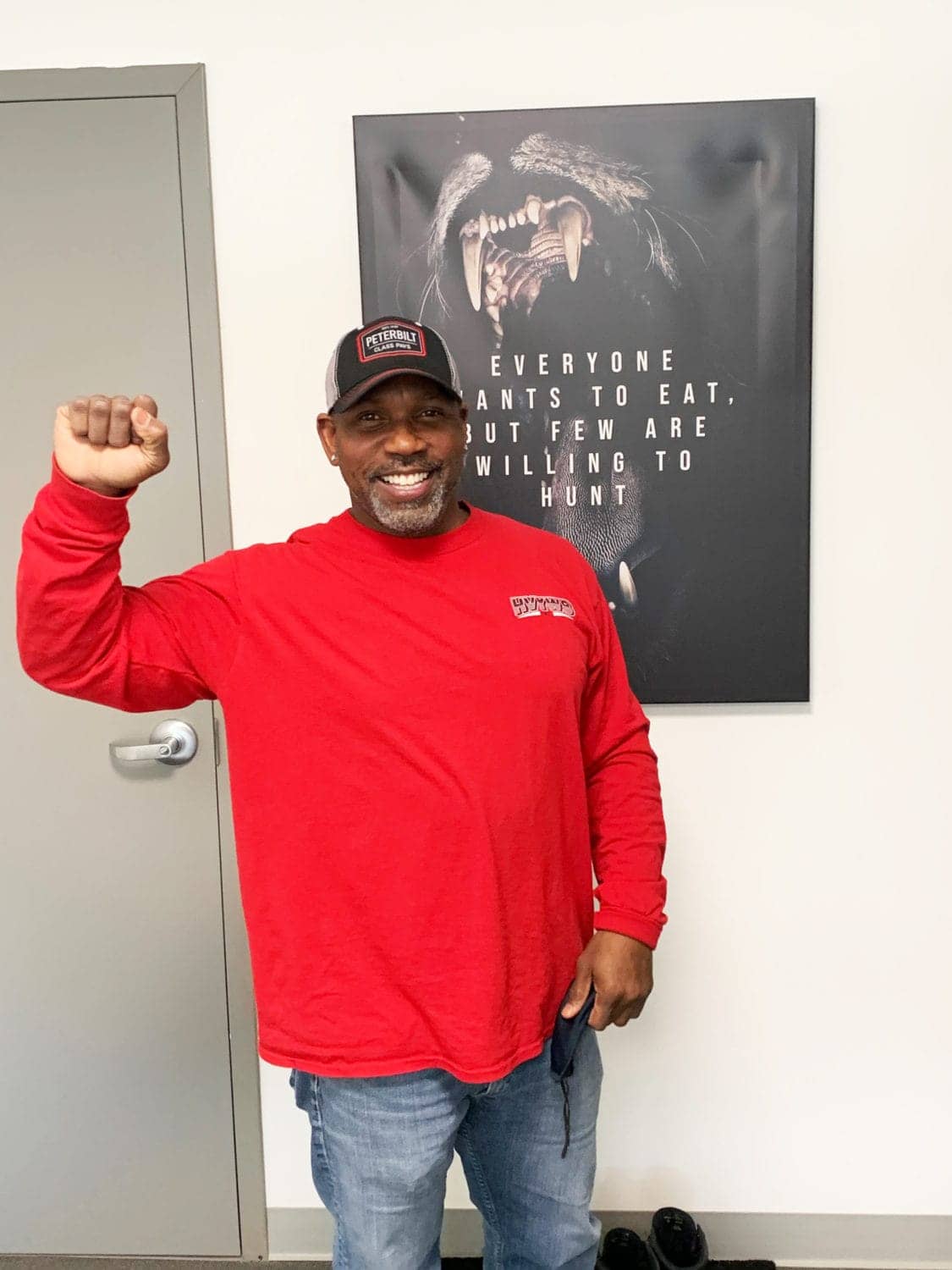 Michael-Gregory-fist-up-HVYW8-Trucking-by-Malik, Black truckers shut down multi-million-dollar UCSF job site for 4.5 hours, Local News & Views 
