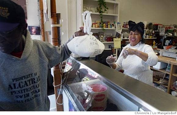 Ernestine-Howard-Wendys-Cheesecake-Bakery-hands-food-to-customer-012612-by-Liz-Mangelsdorf-SF-Chron, Homegoing tribute to Mother Ernestine Howard of the legendary Wendy’s Cheesecake Bakery, Local News & Views 