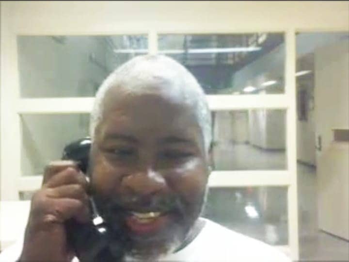 Rashid-on-phone-in-Ohio-0721, The birth, meaning and practice of Black August, Abolition Now! 