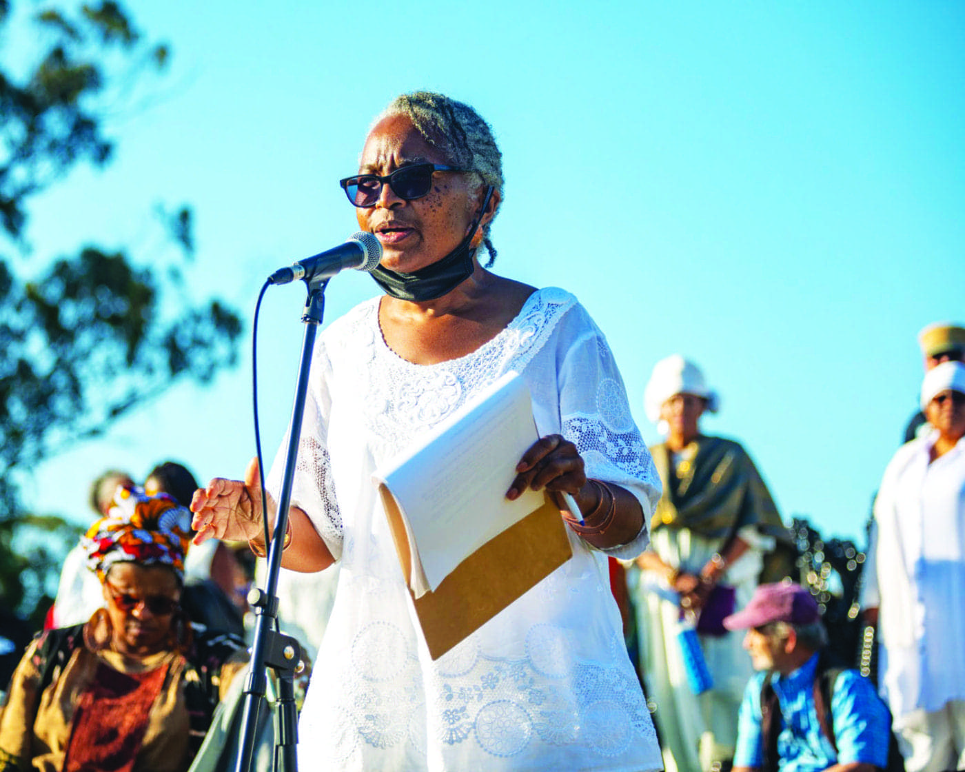 Wanda-Sabir-libations-Monumental-Reckoning-opening-ceremony-by-James-Watkins-061821-1400x1120, Memory lives in the blood. Our ancestors live in us., Culture Currents 