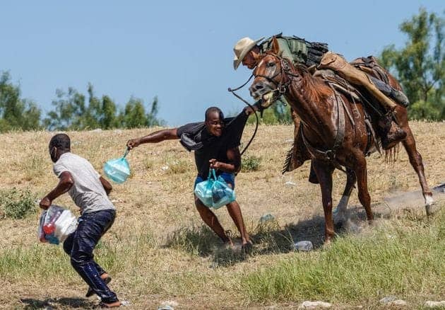 Border-Patrol-agents-whipping-Haitian-migrants-with-horse-reins-by-Paul-Ratje-092021, Haitian refugee crisis made in the USA, border patrol agents whip migrants, World News & Views 