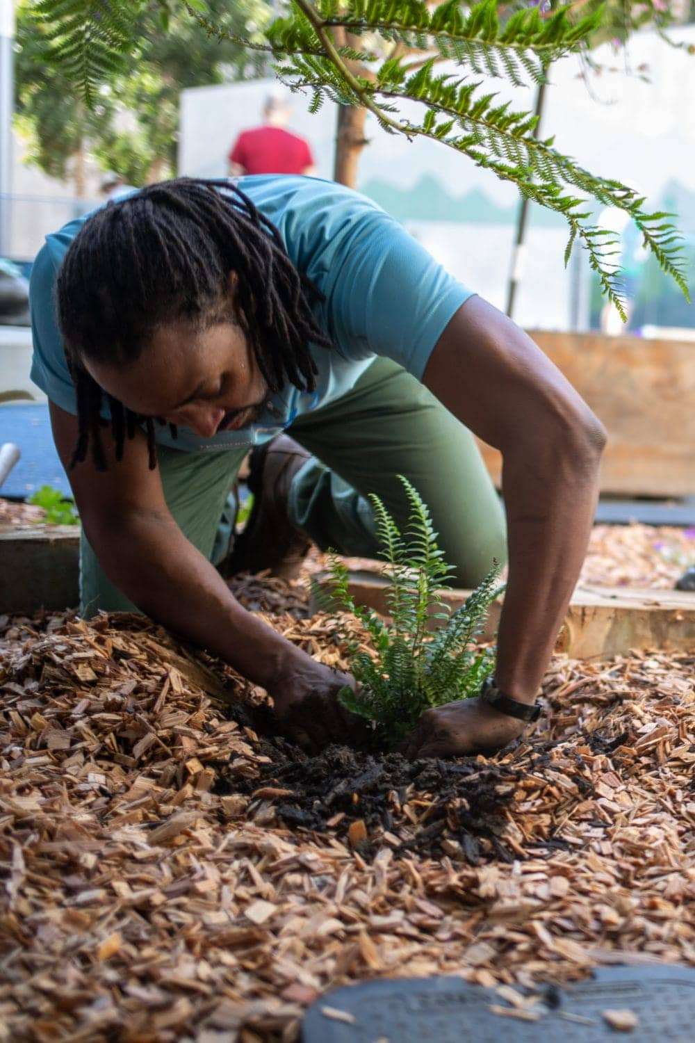 Black-teacher-planting-at-childcare-center-in-San-Francisco-by-Maria-Durana, ‘What’s going on?’, Local News & Views 