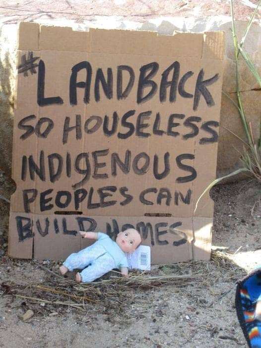 Landback-so-houseless-indigenous-peoples-can-build-homes-sign-on-Colo.-UnTour-Sand-Creek-Massacre-site, A State of Emergency … for people sleeping outside, Local News & Views 