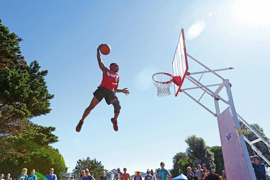 Elandis-Brooks-of-Showtime-Dunk-uses-trampoline-to-dunk-ball-in-Marina-Bay-Park-Richmond-2015-by-Cody-Casares-The-Advocate, Jazz fusion band TBA is taking the Bay by storm, Culture Currents 