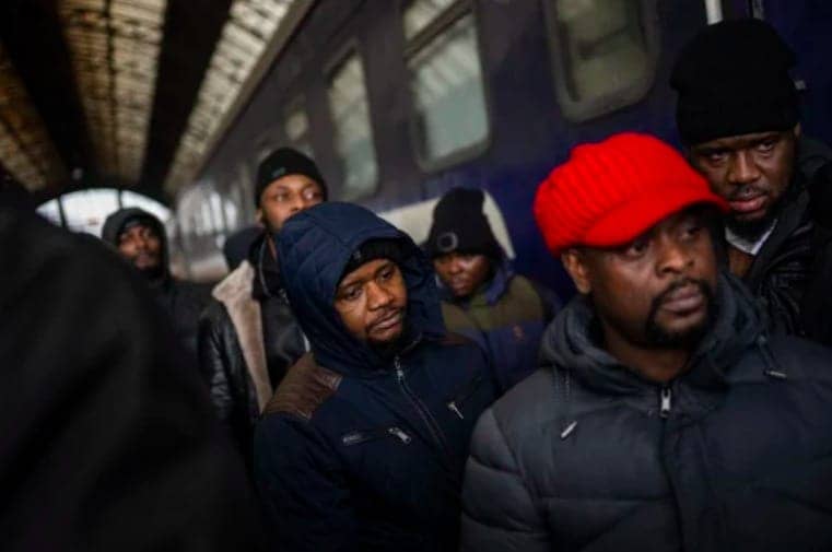 African-residents-in-Ukraine-wait-at-the-platform-Sunday-in-the-Lviv-railway-station-by-Bernat-Armangue-AP-0222, ‘Ukrainians only’: Nigerian student fleeing war describes rampant racism against Africans at border, News & Views 
