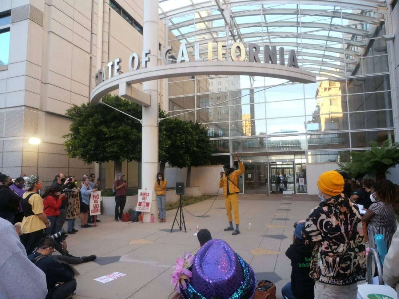 Hunger-Strikers-Andre-Sanchez-and-Moses-Omolade-speaking-at-OUSD-closure-protest-by-Jahahara-0222-1400x1050, Some HERstories and mama wisdom, Culture Currents News & Views 