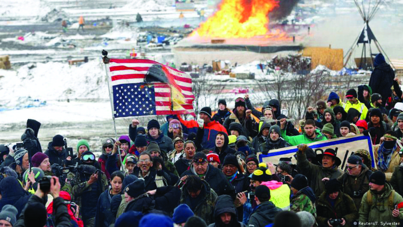 Standing-Rock-anti-Keystone-XL-pipeline-protests-022317-by-T.-Sylverster-Reuters-1400x788, Money, money, money: The real deal behind Putin's invasion of Ukraine, Abolition Now! News & Views World News & Views 