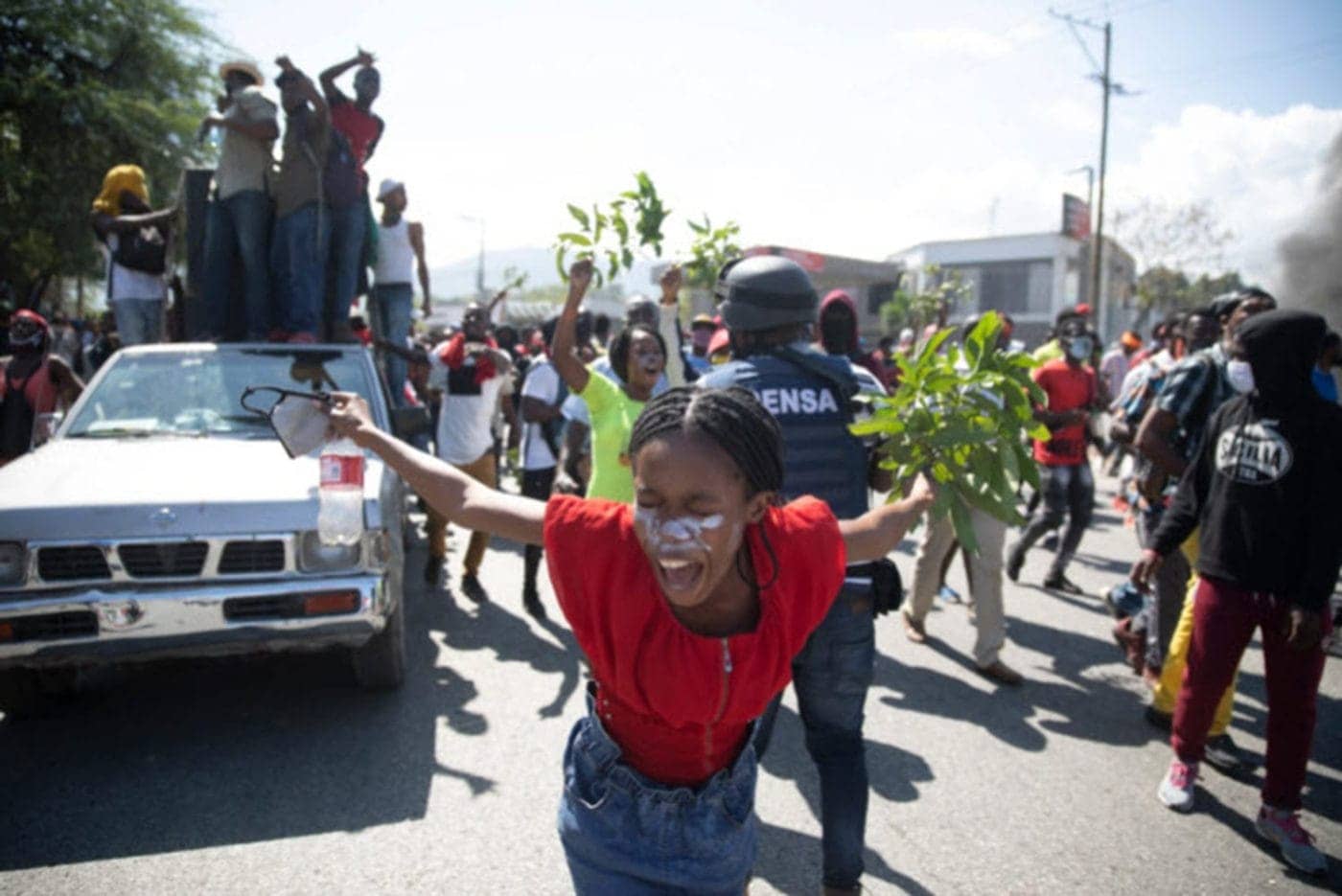 Haitian-factory-workers-strike-demand-salary-increase-0222-by-Odelyn-Joseph-AP-1400x935, Haiti: The ransom is still being paid, News & Views World News & Views 