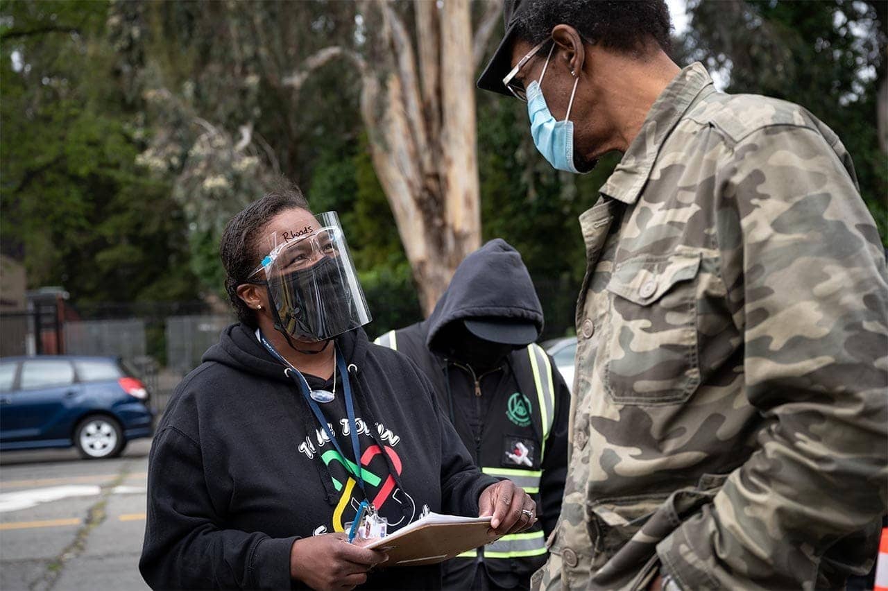 Kim-Rhoads-at-Umoja-Health-vaccine-clinic-Oakland-by-UCSF, UCSF study on long COVID: San Francisco, San Mateo residents urged to share their stories, Local News & Views News & Views 