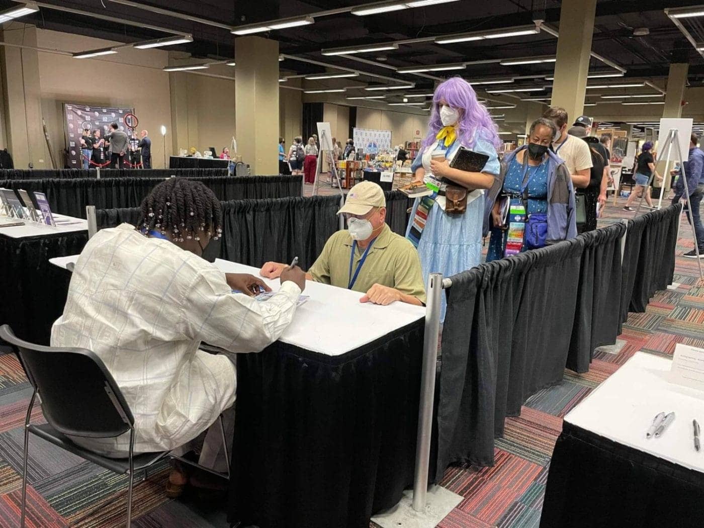Oghenechovwe-Donald-Ekpeki-book-signing-at-WorldCon-0922-1400x1050, First African-born Black Nebula Award winner faces death threats & hostile embassy to attend WorldCon, Culture Currents 
