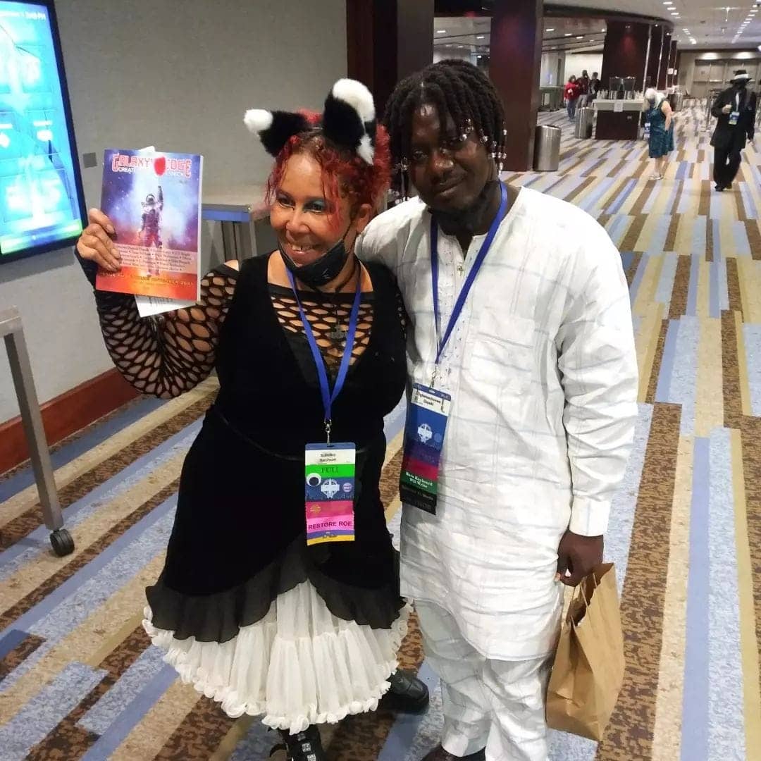 Sumiko-and-Oghenochovwe-at-WorldCon-0922, First African-born Black Nebula Award winner faces death threats & hostile embassy to attend WorldCon, Culture Currents 