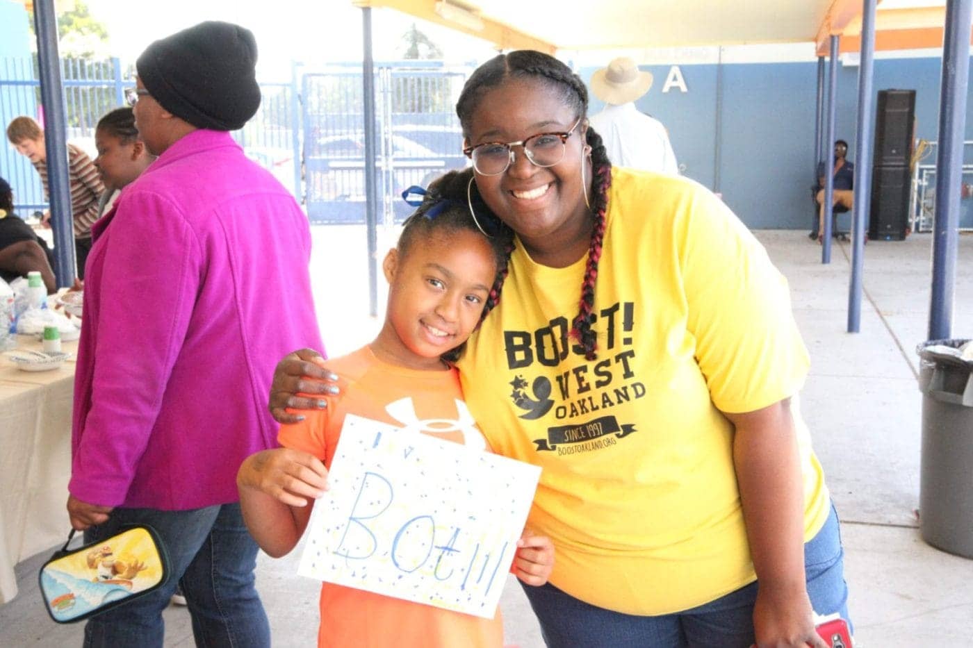 Boost-Executive-Director-Ty-Licia-Hooker-hugs-student-1400x933, <strong>Boost! West Oakland’s CEO Ty-Licia Hooker speaks on academic recovery after the pandemic lockdowns</strong>, Culture Currents Local News & Views 