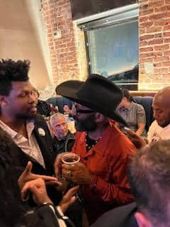 Jamal-Hart-politics-with-DWayne-Wiggins-at-his-62nd-bday-party-021823, Jamal Hart, grandson of Mumia Abu-Jamal, reflects on the 42 years of his grandfather’s political imprisonment – Part 2, Abolition Now! Local News & Views World News & Views 