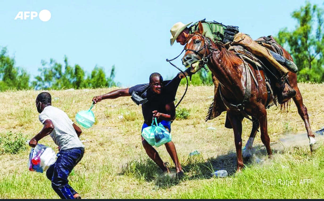 Border-Patrol-agents-whipping-Haitian-migrants-with-horse-reins-092021-by-Paul-Ratje-AFP, In Haiti, 'gang warfare' is a cover for imperialist intervention, Abolition Now! News & Views World News & Views 