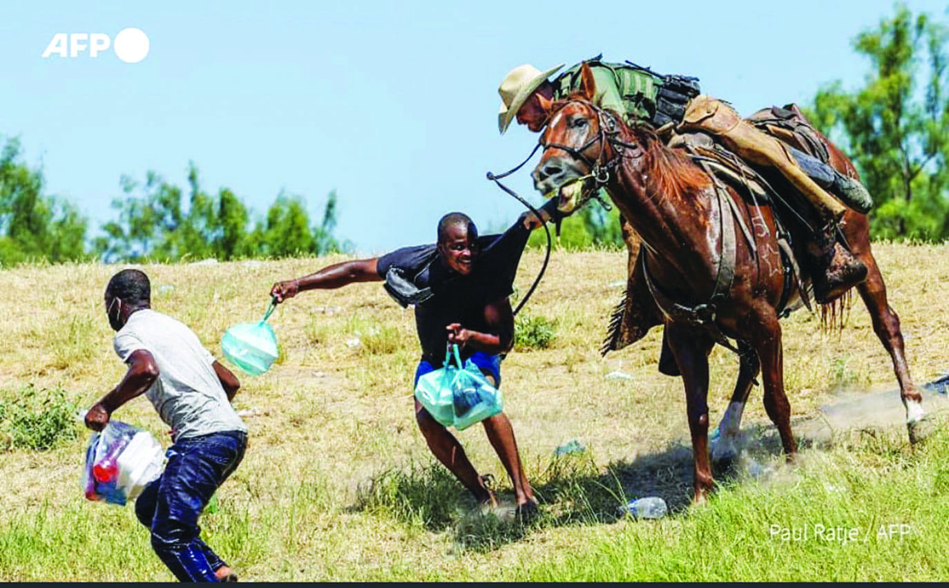 Border-Patrol-agents-whipping-Haitian-migrants-with-horse-reins-092021-by-Paul-Ratje-AFP, In Haiti, 'gang warfare' is a cover for imperialist intervention, Abolition Now! News & Views World News & Views 