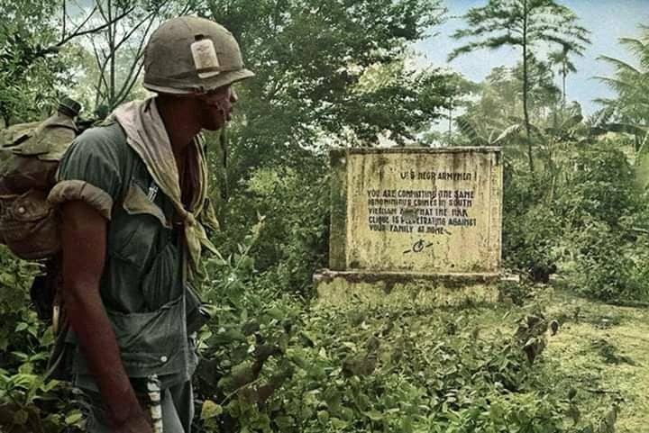 Black-US-soldier-reads-Viet-Cong-wartime-sign-U.S.-Negro-Armymen-you-are-committing-the-same-ignominious-crimes-in-South-Vietnam-that-the-KKK-clique-is-perpetrating-against-your-family-at-home, Rumors of WW3: Biden’s actions hint at military draft on the horizon, Featured News & Views 
