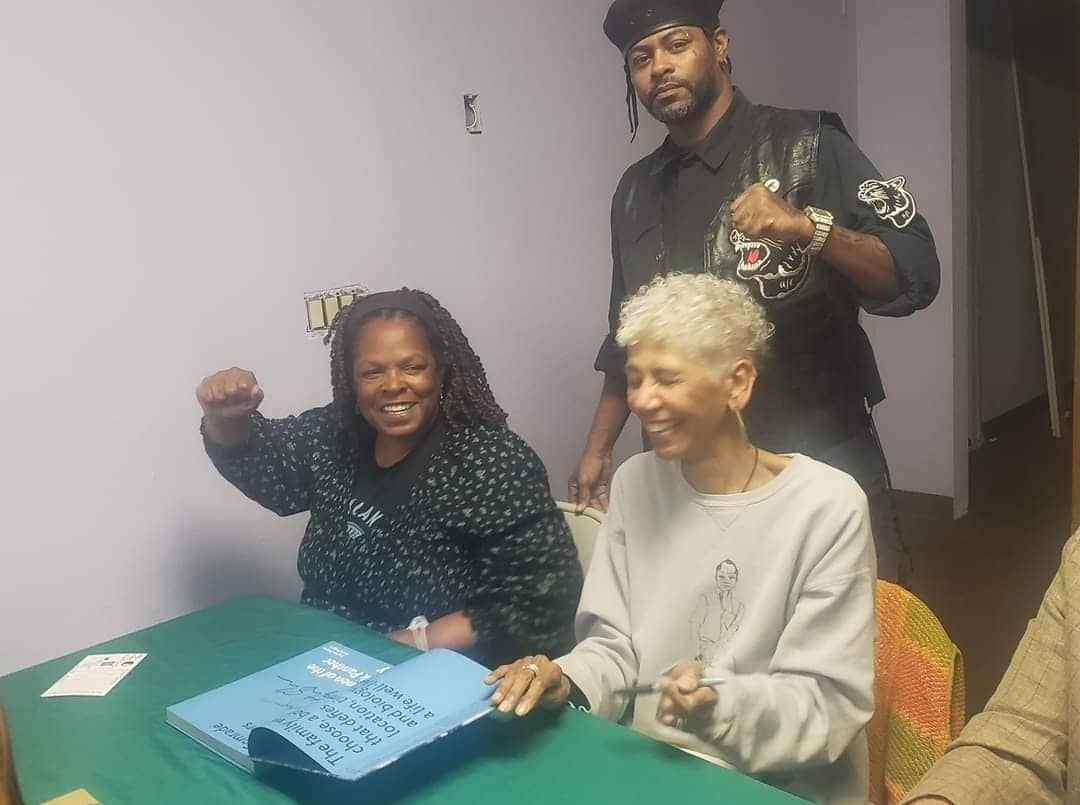 Jeelani-Shareef-and-elder-Erica-Huggins-of-the-Black-Panther-Party-, Jeelani Shareef, financial freedom fighter, Featured Local News & Views 