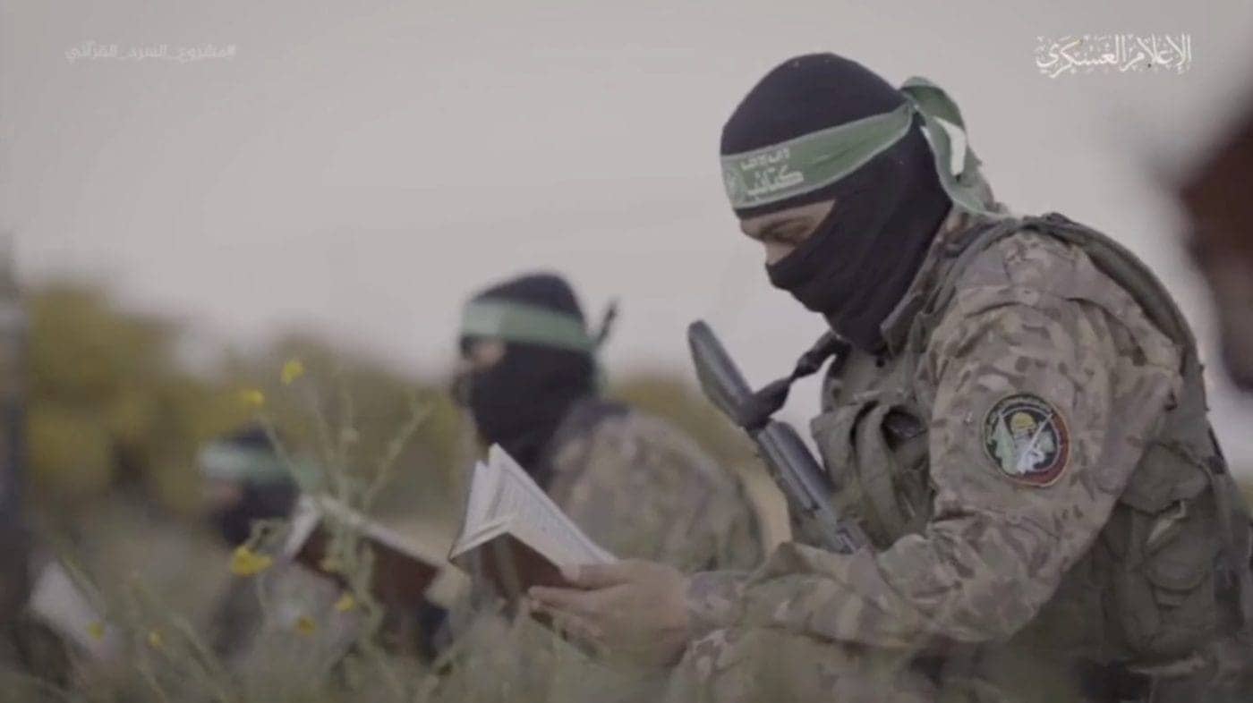 Al-Qassem-Brigade-fighter-reading-Quran-1400x786, Operation Al Aqsa Flood: Palestine, Israel and Resistance, Featured World News & Views 