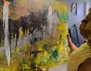 Ariana_the_Artist_holding_her_painting.thumbnail, ‘Out of the Darkness’ comes an artist!, Culture Currents Featured News & Views Photo Gallery 